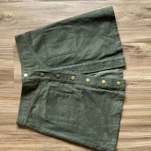 Mini green corduroy button up skirt